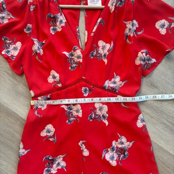 Sienna Sky Floral Romper | Short Flutter
Sleeve Romper - Picture 7 of 8